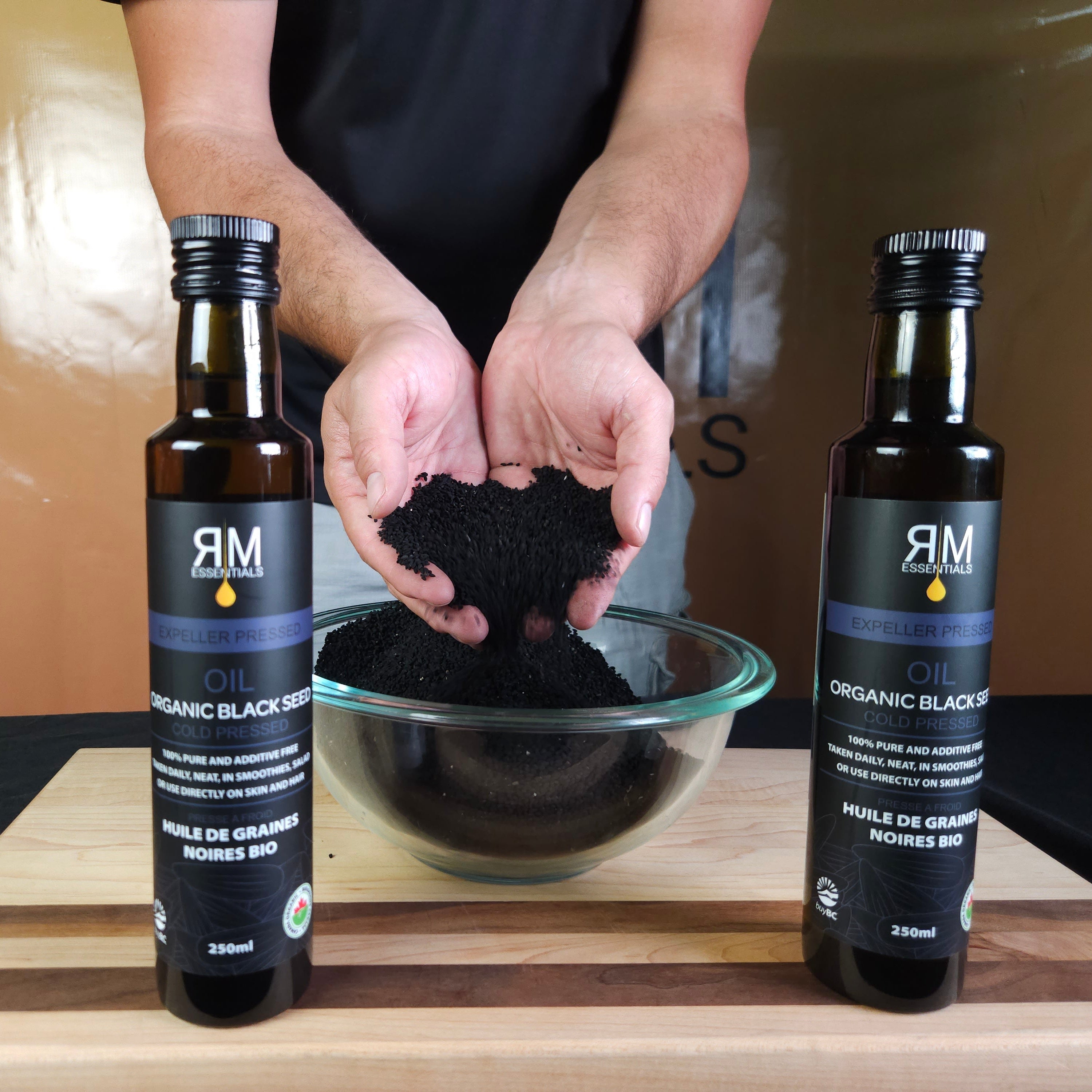 Levi with Black Seeds and Finished Bottles